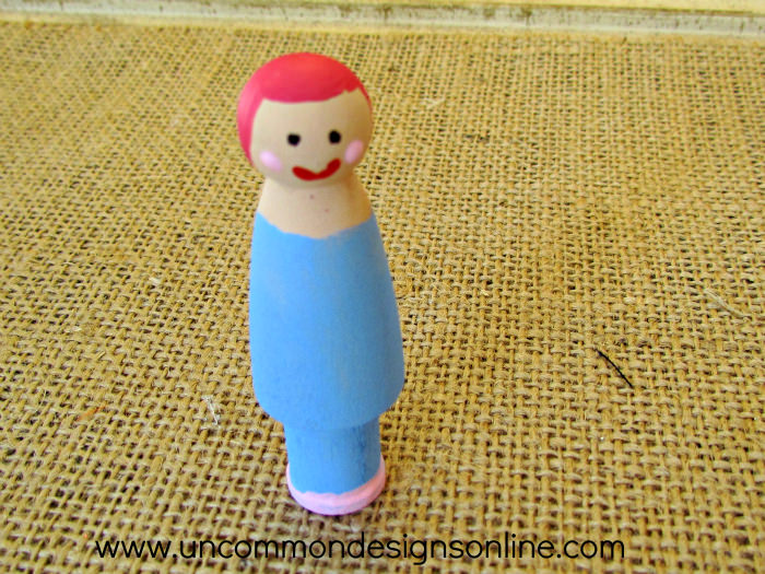 peg doll snow globe ornament