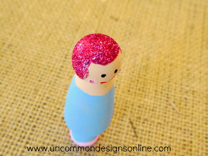 peg doll snow globe ornament