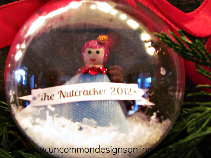 peg doll snow globe ornament