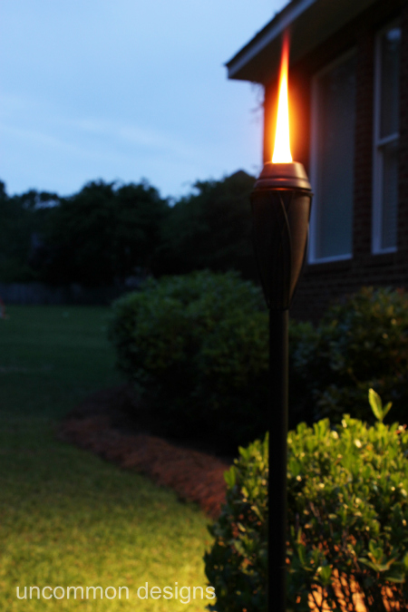 tiki torch at night