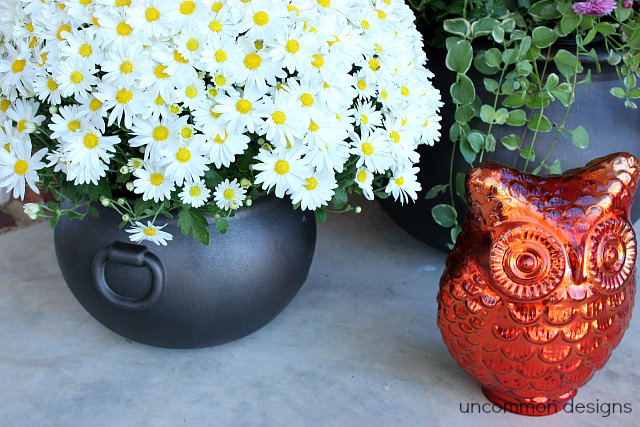 spray painted plastic cauldrons