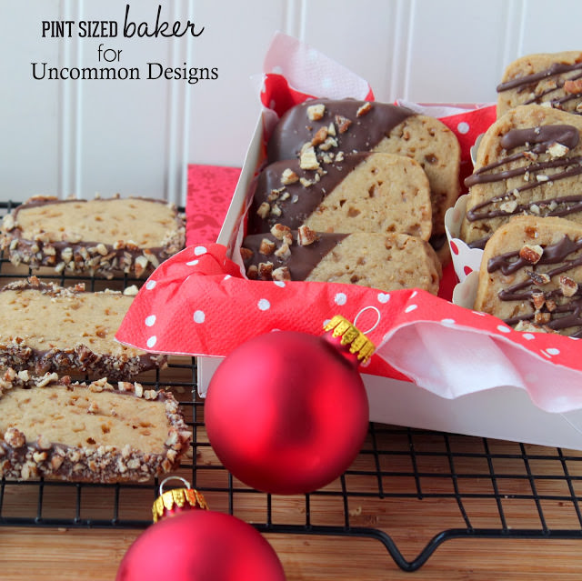 Chocolate Dipped Toffee Cookies... The yummiest sweet treat you have ever given!  #Christmas  #Cookies  via www.uncommondesignsonline.com