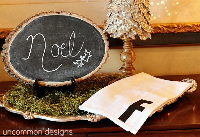 No Sew Monogrammed Towel... the Perfect Gift for Everyone on your list.  All you need is a flour sack towel and iron on letters.  #Christmas  #NoSew  #HandmadeGifts  via www.uncommondesignsonline.com