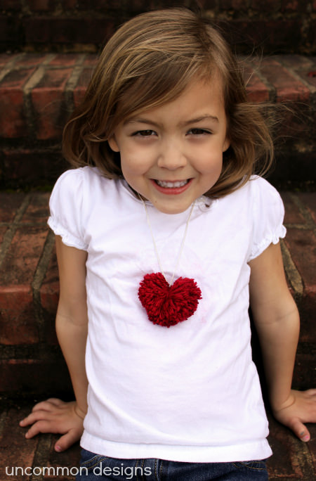 DIY Pom Pom Heart Necklace... a cute and easy Valentine's craft. via www.uncommondesignsonline.com #PomPom #ValentinesDay