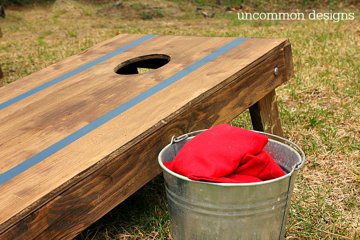 How to Customize a Cornhole Board #FrogTape #ad www.uncommondesignsonline.com