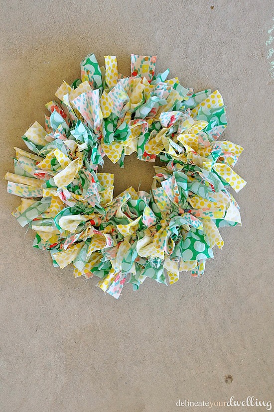 Create an adorable Summer Fabric Wreath with these step by step instructions. You choose the colors, patterns and designs. What a great way to brighten a door! #fabric #wreath