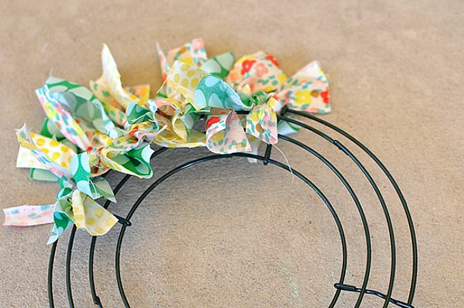 Create an adorable Summer Fabric Wreath with these step by step instructions. You choose the colors, patterns and designs. What a great way to brighten a door! #fabric #wreath