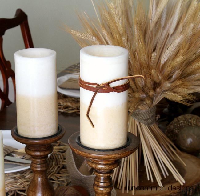 DIY Leather Wrapped Candles via Uncommon Designs. Such a super simple idea and beautiful! 