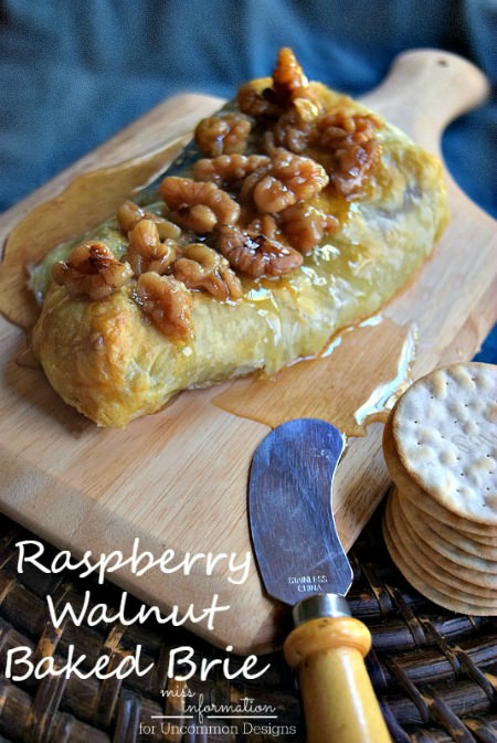The perfect Holiday Appetizer!  Raspberry Walnut Baked Brie via Uncommon Designs 