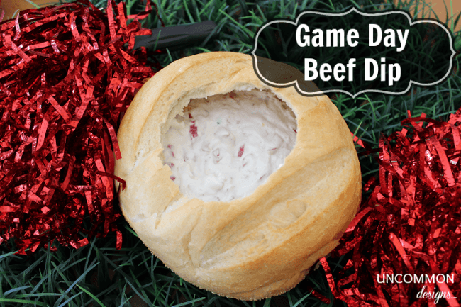 Warm and creamy Game Day Beef Dip via Uncommon Designs. Add it to your next tailgating party. 