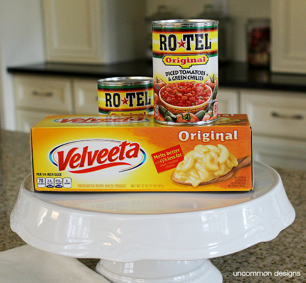 Create a simple 2 ingredient Queso with RO*TEL and VELVETTA. We even created a fun dipping station via Uncommon Designs.