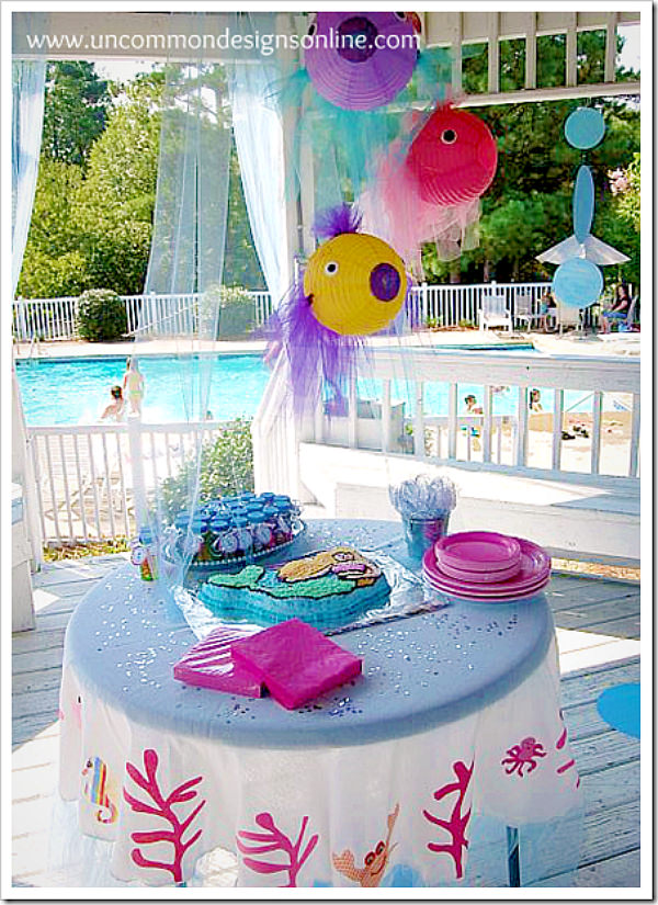 Mermaid birthday party with fabulous decorations and ideas via Uncommon Designs.