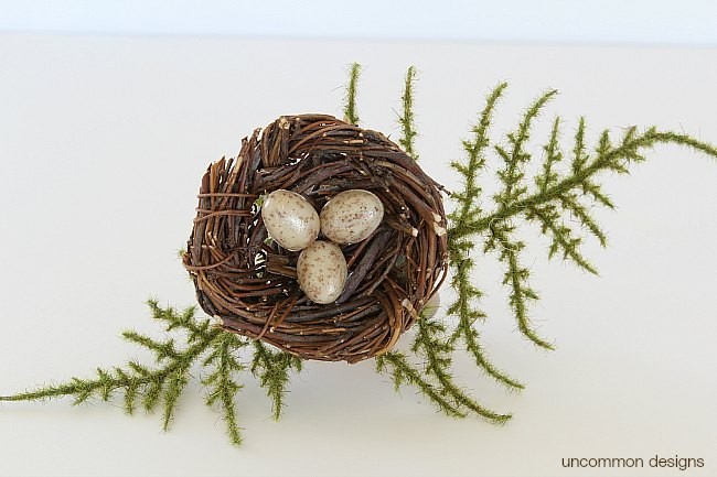 How to make Bird's Nest Napkin Rings for your spring and Easter tablescape via Uncommon Designs.