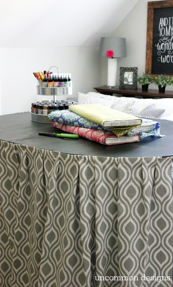 Make a raised and skirted craft table with Uncommon Designs.  Hide all of your junk and craft supplies with style! 