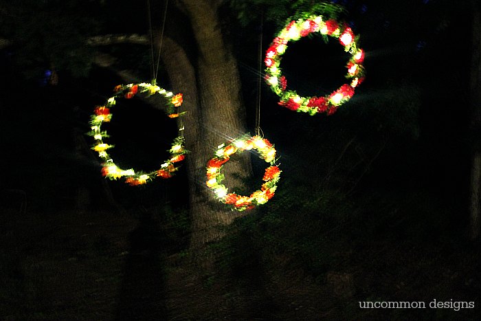 Make a lit photo backdrop with flowers and hula hoops!  A simple step by step tutorial by Uncommon Designs 