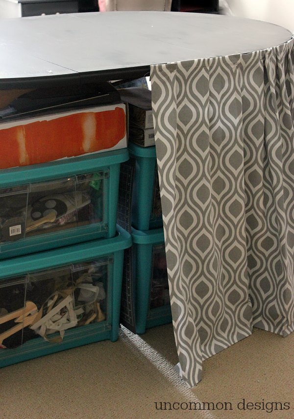Make a raised and skirted craft table with Uncommon Designs.  Hide all of your junk and craft supplies with style! 
