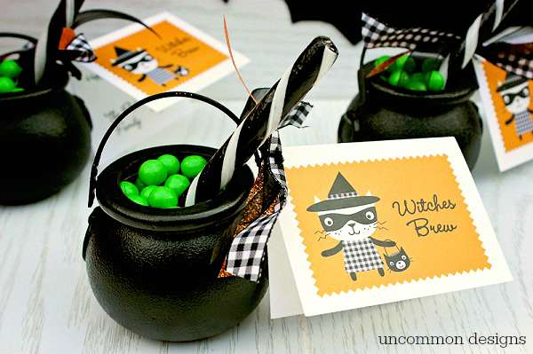 Serve up these adorable Witches Brew Halloween Treats to your family and friends. These cute cauldrons full of bubbling sweetness are great for party favors, classroom parties, and boo gifts! | Uncommon Designs