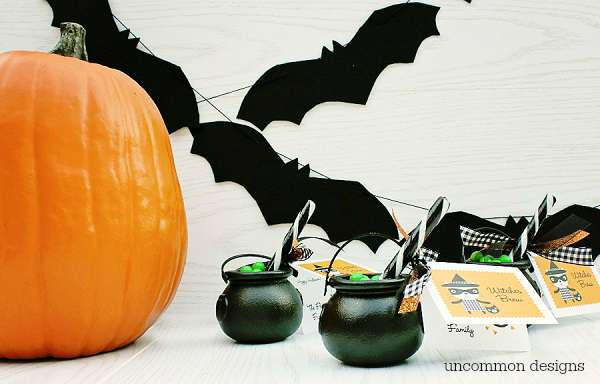 Serve up these adorable Witches Brew Halloween Treats to your family and friends.  These cute cauldrons full of bubbling sweetness are great for party favors, classroom parties, and boo gifts!  | Uncommon Designs 
