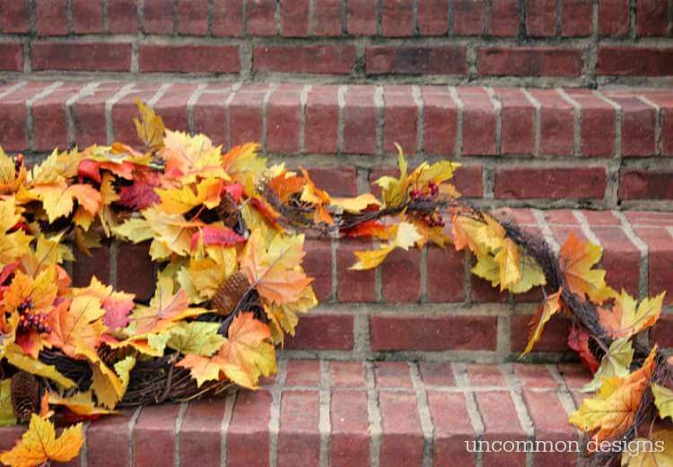 Make a fall leaf wreath in just minutes! Grab a few garlands and a grapevine wreath and you can create this beauty with Uncommon Designs 