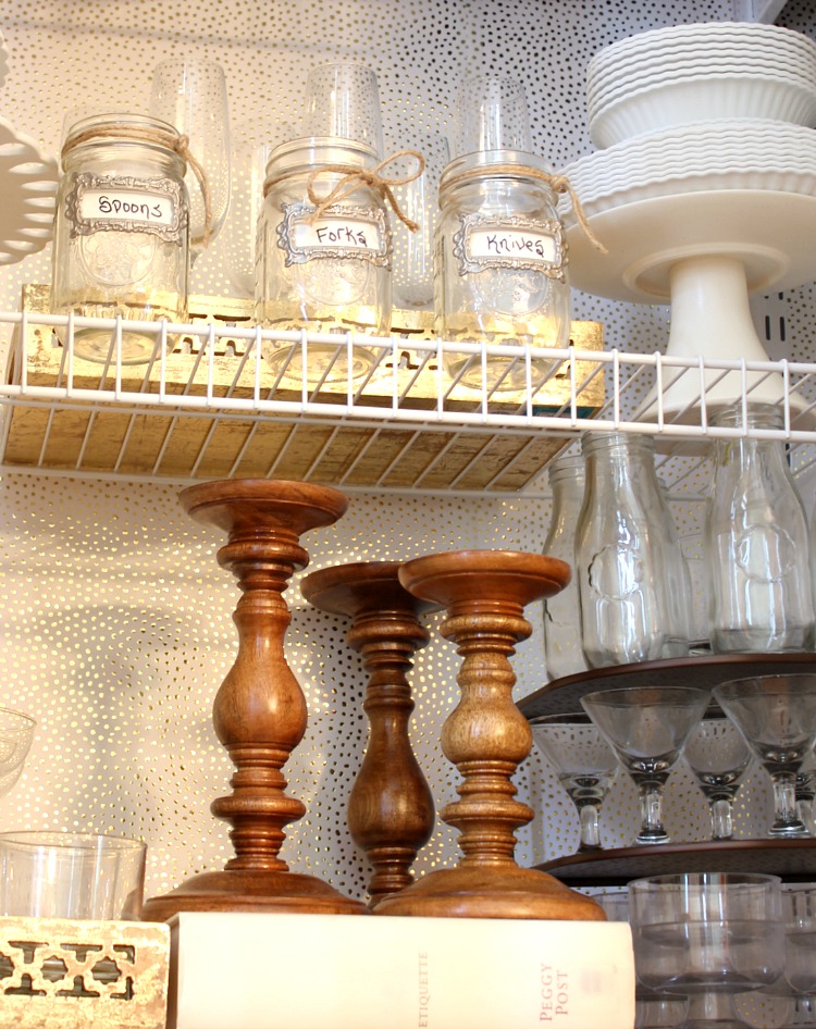 Transform a rarely used coat closet into an entertaining closet. It is the perfect place for storage of cake stands, trays, candle sticks and glassware. Having everything at your fingertips makes entertaining a breeze and there is still room for storing your guests coats! 