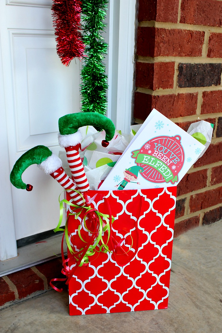 Enjoy this fun new tradition at work or in your  neighborhood. Elfing your Neighbor is so much fun to do and we are sharing inspiring ideas and Free Printables! Find more at https://uncommondesignsonline.com #Christmas #HolidayTraditions #FamilyFun