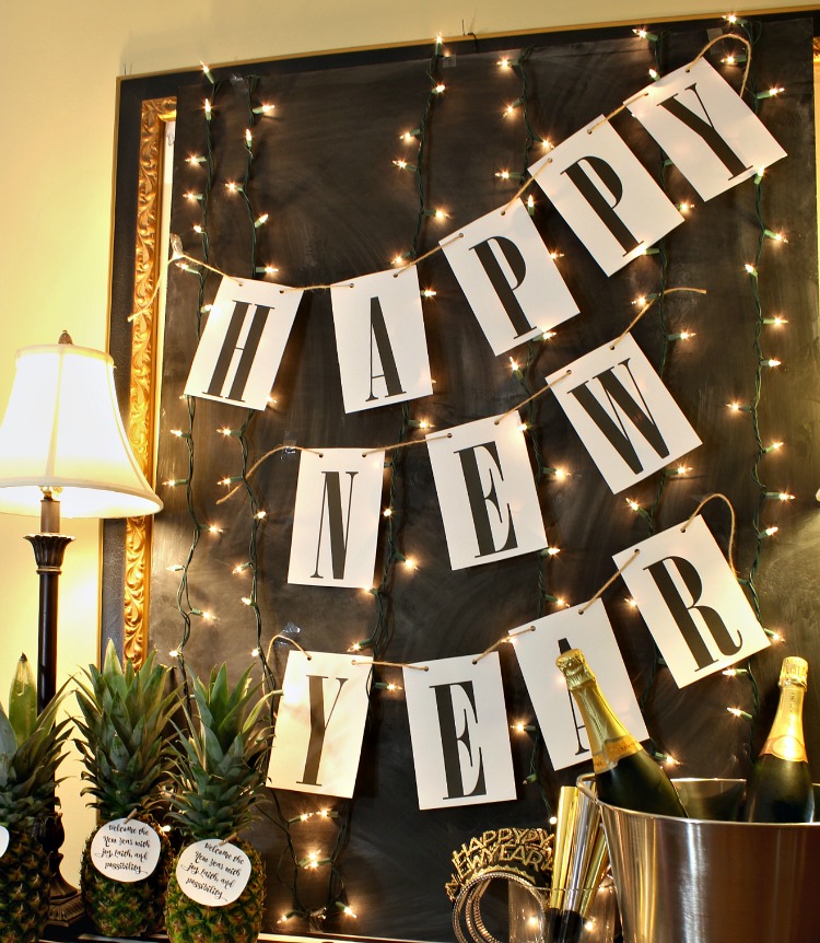 Ring in the new year with this simple Happy New Year free printable banner. It will match any decor and it is so easy to print and hang! See it at https://uncommondesignsonline.com #NewYearsEve #Free Printables