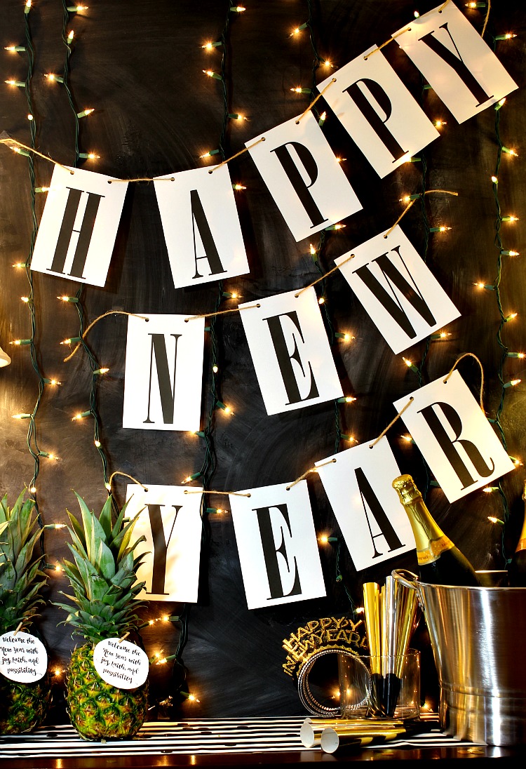 Ring in the new year with this simple Happy New Year free printable banner. It will match any decor and it is so easy to print and hang! See it at https://uncommondesignsonline.com #NewYearsEve #Free Printables