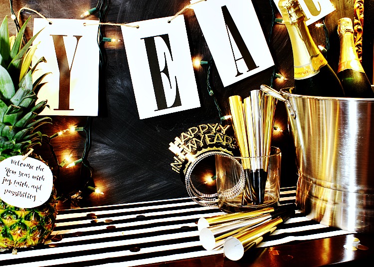 Ring in the new year with this simple Happy New Year free printable banner. It will match any decor and it is so easy to print and hang! See it at https://uncommondesignsonline.com #NewYearsEve #Free Printables