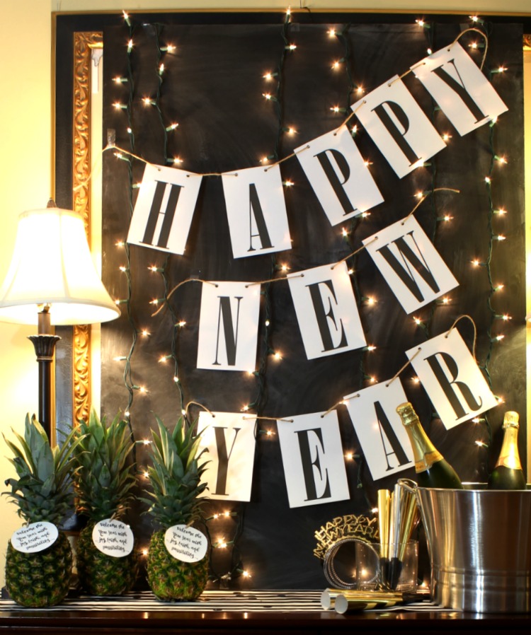 Ring in the new year with this simple Happy New Year free printable banner. It will match any decor and it is so easy to print and hang! See it at https://uncommondesignsonline.com #NewYearsEve #Free Printables