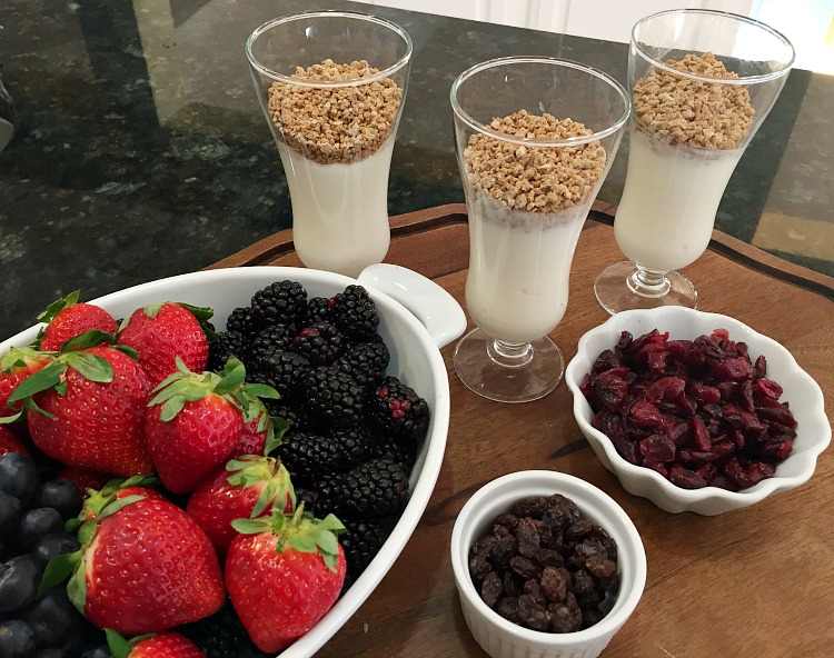 These yogurt parfaits topped with grape nuts cereal are a fun way to get your kids to eat a wholesome breakfast and they who doesn't love eating out of fancy glasses? 
