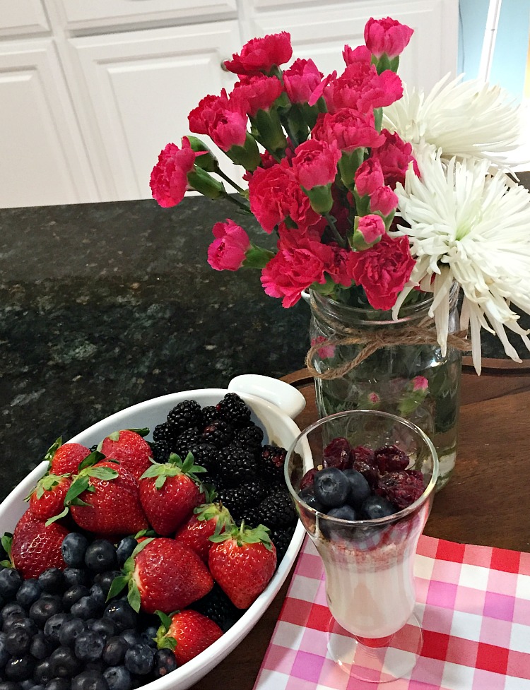 These yogurt parfaits topped with grape nuts cereal are a fun way to get your kids to eat a wholesome breakfast and they who doesn't love eating out of fancy glasses? 