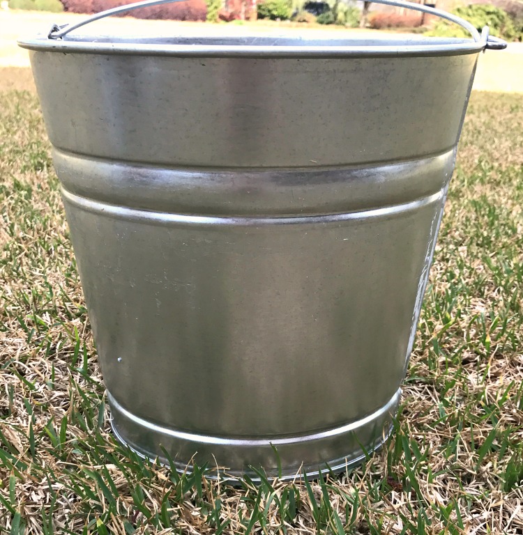 How to age a shiny new galvanized metal pail. Go from shiny to vintage in just a few minutes. 