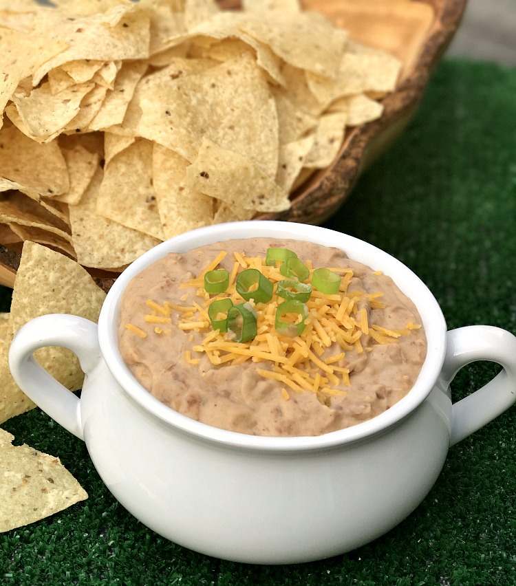 It is football time and my favorite season for this recipe for Spicy Bean Dip. Grab your cheese, Luck's Pinto Beans and favorite flavorings for this super quick dish! 