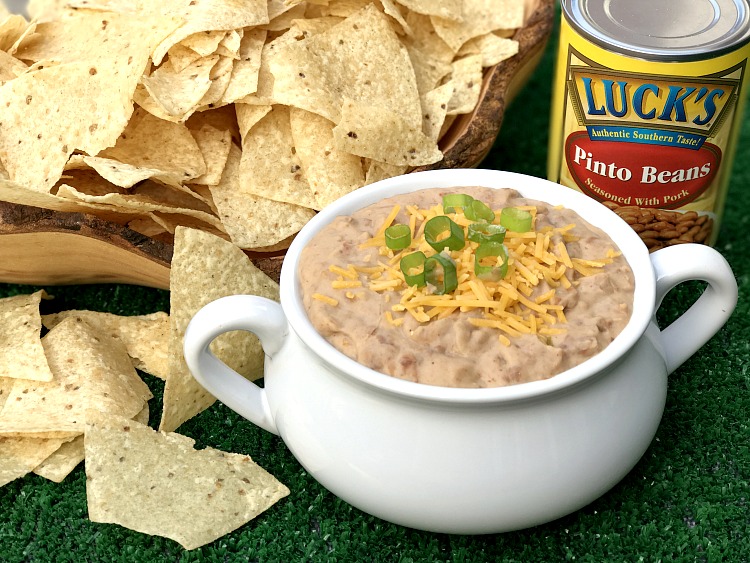 It is football time and my favorite season for this recipe for Spicy Bean Dip. Grab your cheese, Luck's Pinto Beans and favorite flavorings for this super quick dish! 