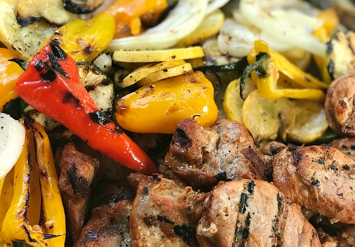 Fast and easy marinated pork medallions and grilled veggies. This is summer on a plate! #RealFlavorRealFast #CollectiveBias #ad 