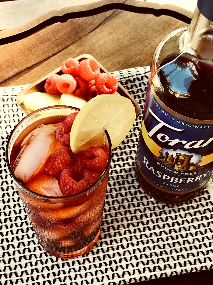 Who is ready for a little summer refreshment? This sugar-free raspberry sweet tea recipe is going to become your go-to summer drink of choice. The whole family will love it! #ad #collectivebias #ToraniEndlessSummer