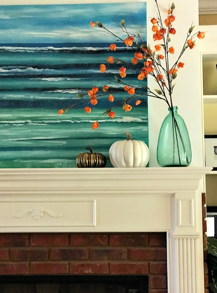 A coastal fall mantel. These simple fall decorations and a little paint made this project crazy easy! 