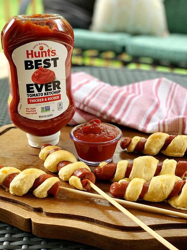 Tornado Dogs | Hot Dogs on a stick with a twist. Amp up the summer fun with this hot dog recipe for an easy dinner idea. With only a few ingredients and Hunt's Best Ever Ketchup, dinner is yummy and fun! 