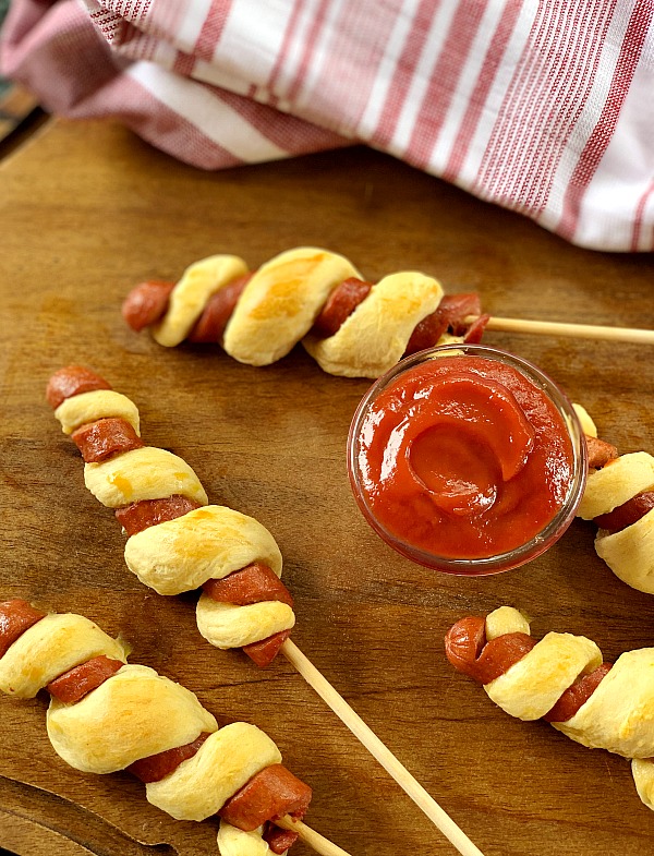 Tornado Dogs | Hot Dogs on a stick with a twist. Amp up the summer fun with this hot dog recipe for an easy dinner idea. With only a few ingredients and Hunt's Best Ever Ketchup, dinner is yummy and fun! 